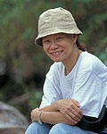 Lee resting at the remote "Proboscis Beach", Borneo, after an extreme hike through the jungle. Photo � 2002 by Dean M. Chriss.